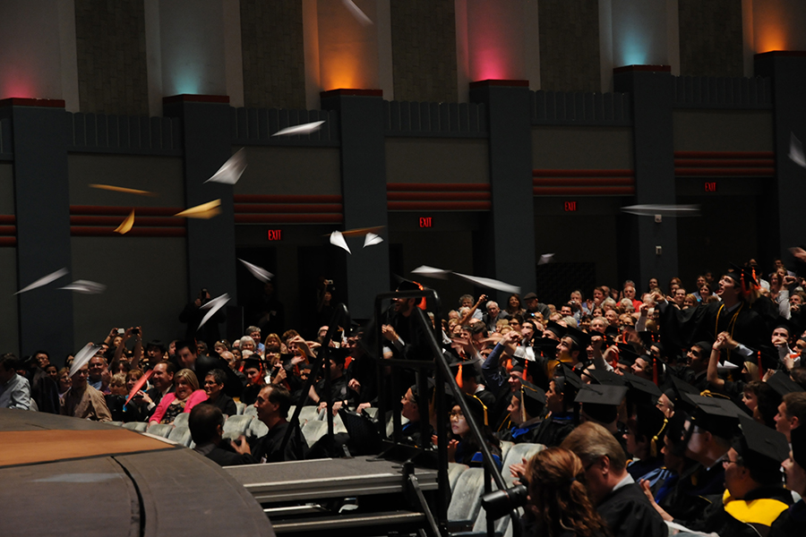 A salvo of paper airplanes at 2012 Commencement