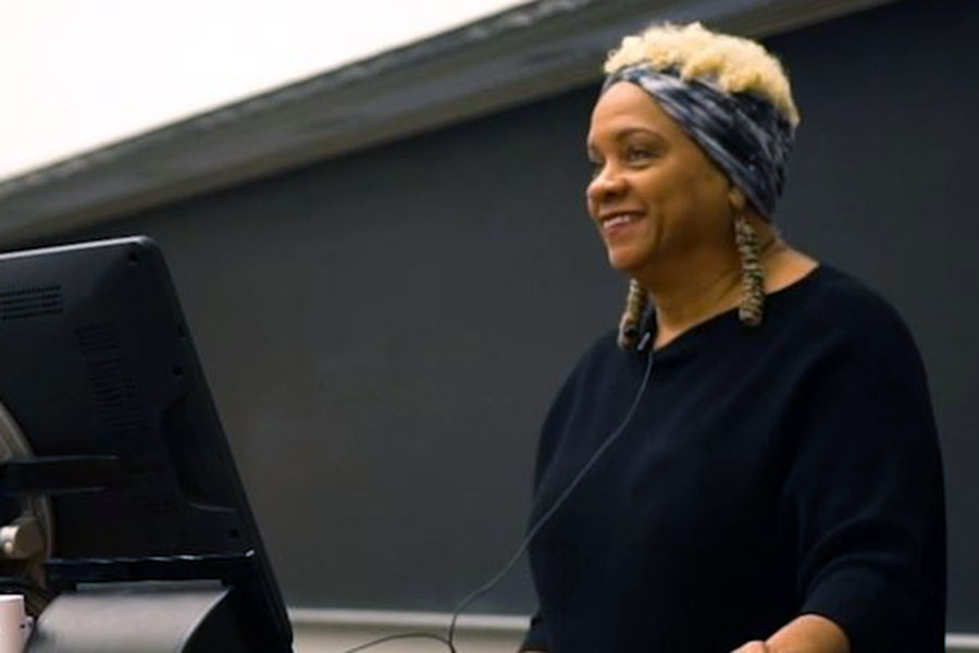 Virginia Booth Womack speaking to students at EABC