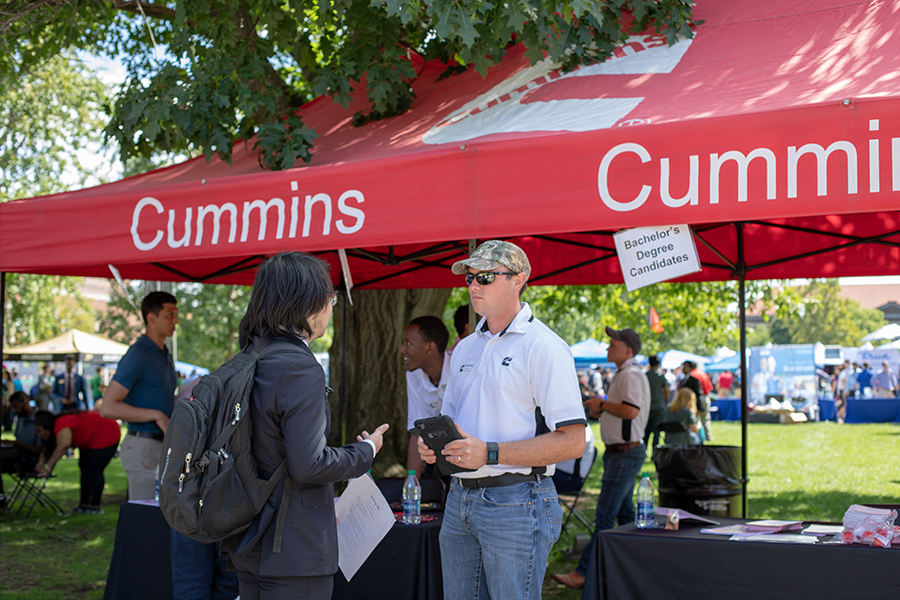 Recruiter and student talking