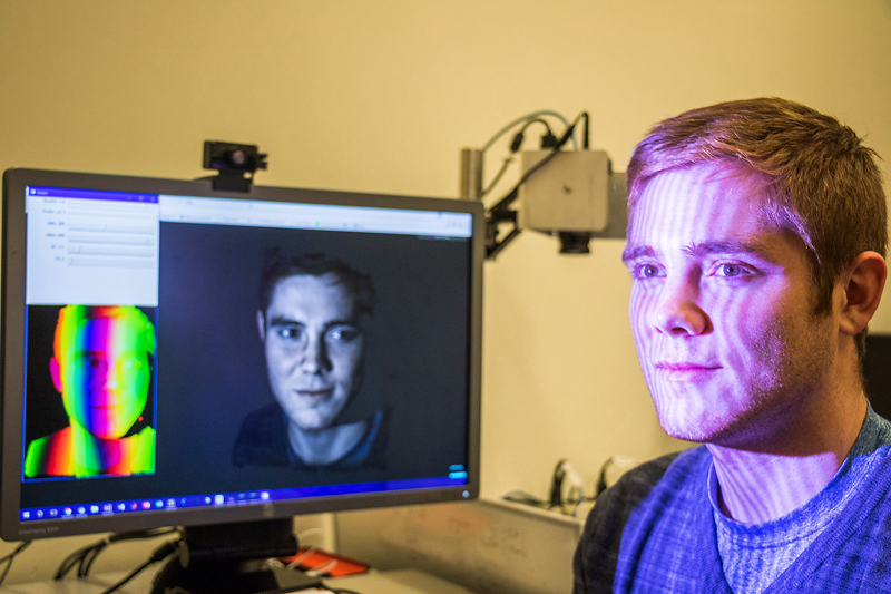 Purdue doctoral student Tyler Bell is lead author of a new research paper about Holostream, an innovative platform that allows high-quality 3-D video communications on mobile devices such as smartphones and tablets. The research is led by Song Zhang, an associate professor in Purdues School of Mechanical Engineering.
