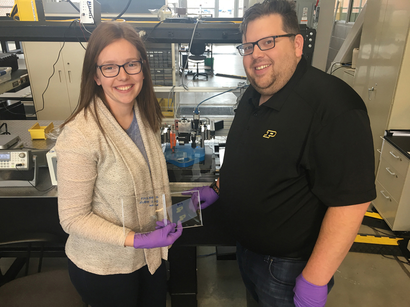 The inkjet-printer was built at Purdue’s Herrick Labs by Allison Murray, left, a doctoral candidate in mechanical engineering, under the direction of professor Jeff Rhoads, right.