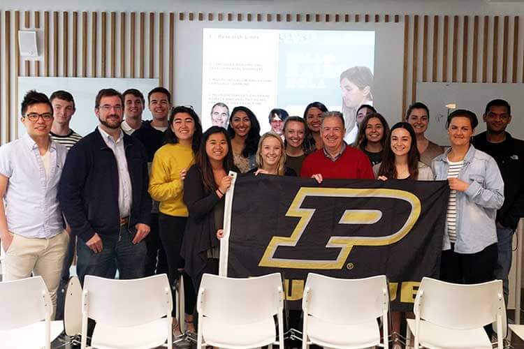 SA 10526 students and staff show Purdue spirit at the Basque Center of Brain Cognition and Language (BCBL) in San Sebastian, Spain