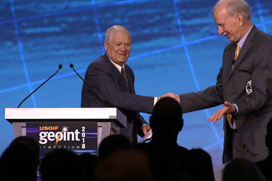 Mikhail receiving the Lundahl Finnie lifetime achievement award
