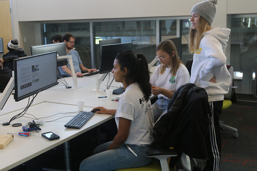 Junior MDE Karuna Srivastava works on the computer with her team to perfect their innovative keyboard.