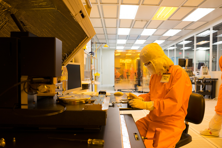Tingting Shen works on improving computer chip logic, memory, and interconnects in a clean room.