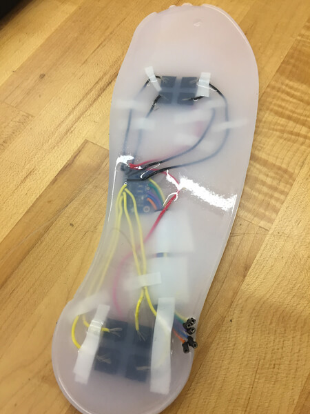An insole shoe sensor developed at Purdue helps to measure the full range of forces on the foot.