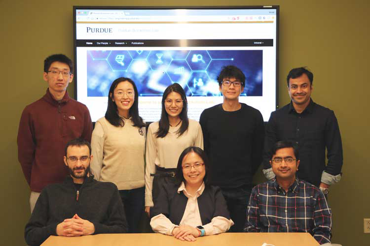 Purdue Blockchain Lab group — Front (left to right): Mario Ventresca, Hong Wan, Vaneet Aggarwal; Back (left to right): Fang Chen, Xinqi Gao, Larissa Mori, Bryan Chong, and Arnob Ghosh