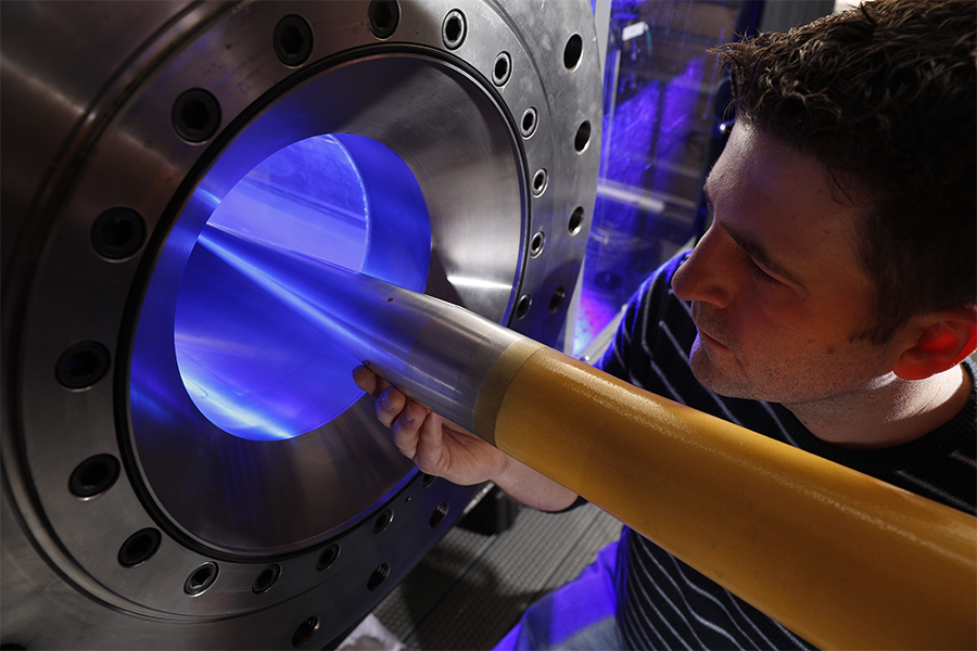 Male student working in the Mach 6 Wind Tunnel at Purdue 