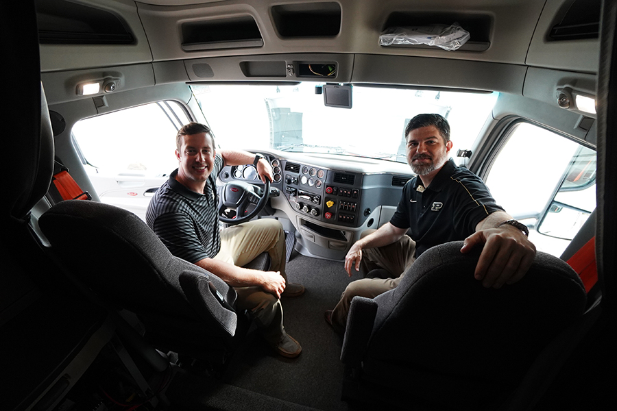 Photo of Thayer and Shaver in cockpit