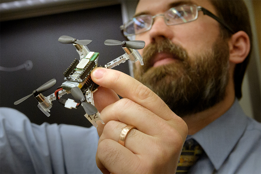 Photo of Goppert holding drone