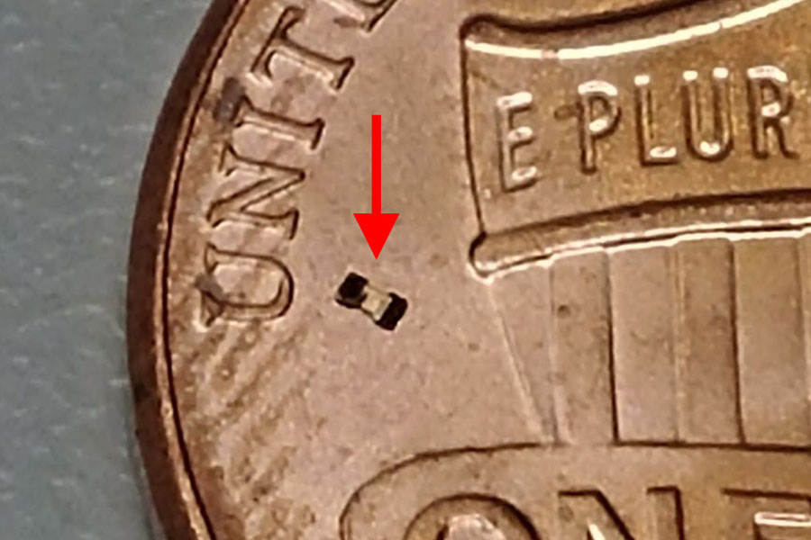 Photo of microrobot on penny