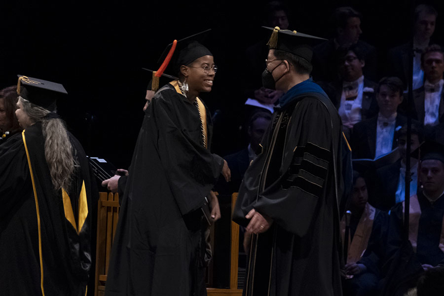 Photo of Destiny White on stage at 2022 Commencement