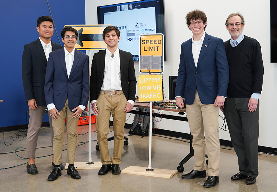 Four students, advisor