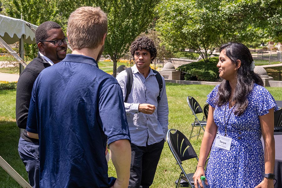 (R-L): Tanya Purwar, a PhD student in Purdue Mechanical Engineering; Khalil Castillo-Aponte, a PhD student in the Department of Chemistry; Brandon Harrison, a former Purdue Trailblazer Fellow and postdoc in ME and the Elmore Family School of Electrical and Computer Engineering; and Zackary Foss Van Zante, an ME masters student, chat during one of the breaks at the Blue-Integrated Partnerships (BIP) conference. 