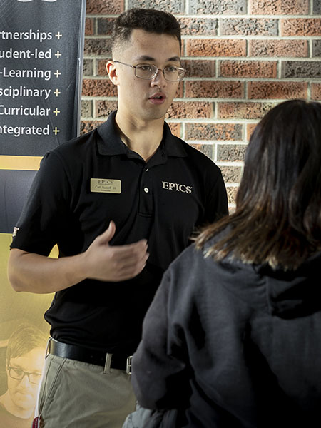 Carl Russell III speaking during Family Day