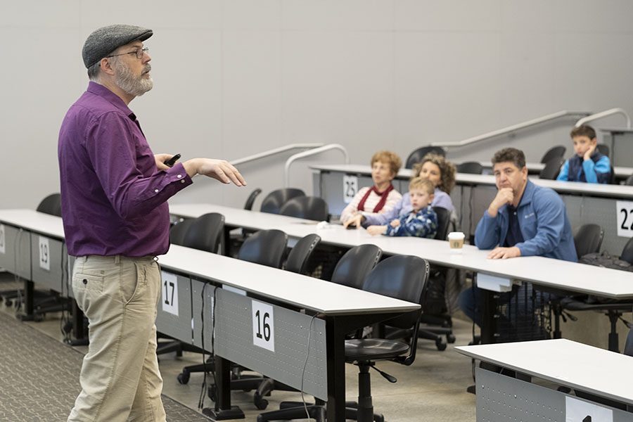 Jason Morphew, assistant professor in the School of Engineering Education, shares data during a presentation for Family Day attendees.  