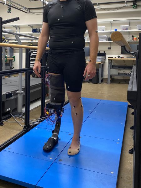 Research participant wears motion-capture markers while testing an embroidered sensor prosthetic in a Notre Dame lab.