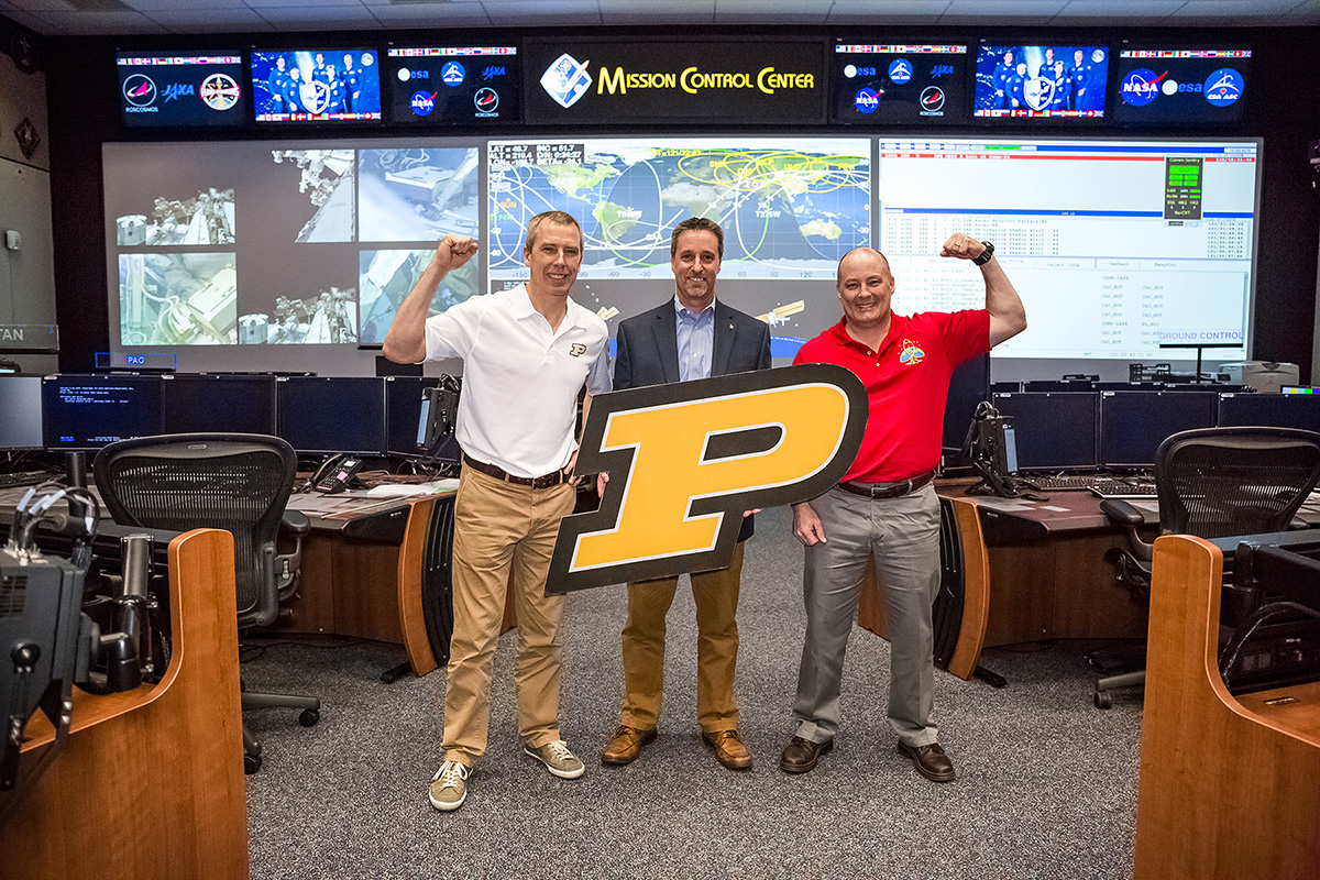 NASA is teaming with Purdue graduates. Astronaut Drew Feustel (left) will join Scott on the International Space Station in March 2018, and Gary Horlacher (middle) will serve as Flight Director.