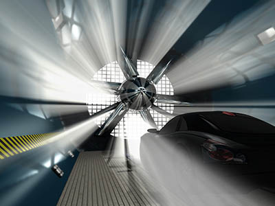 A wind tunnel with a car mocked up inside it