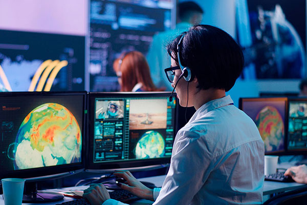 A woman sitting at a computer