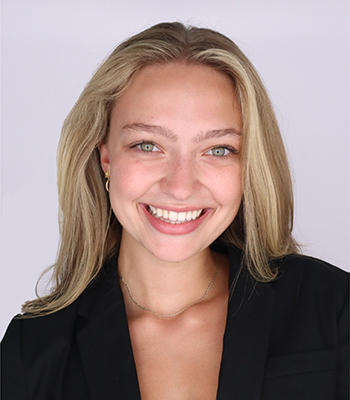 Woman with blonde hair and green eyes