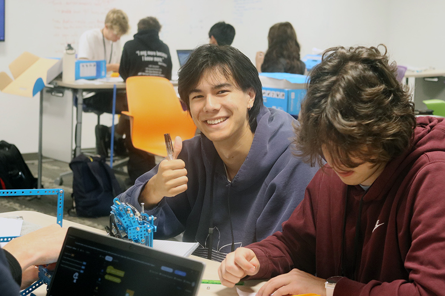 Student thumbs up