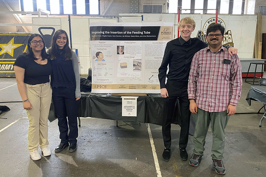 Four students smiling