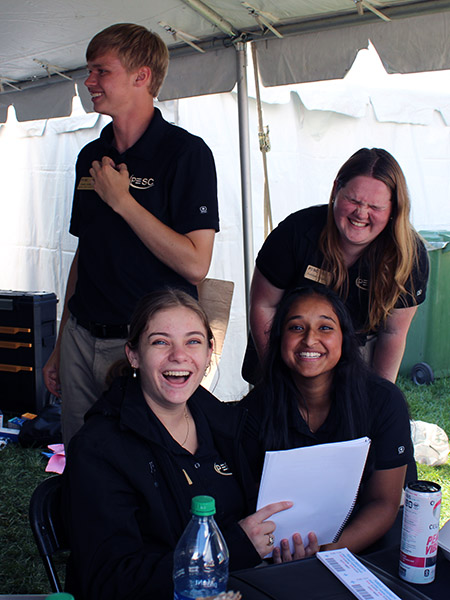 Students in tent working IR