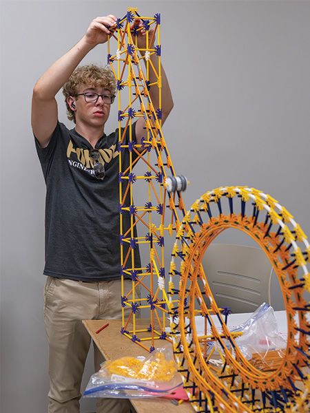 Student working on coaster project.