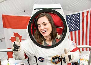 Photo of Jocelyn Dunn in spacesuit
