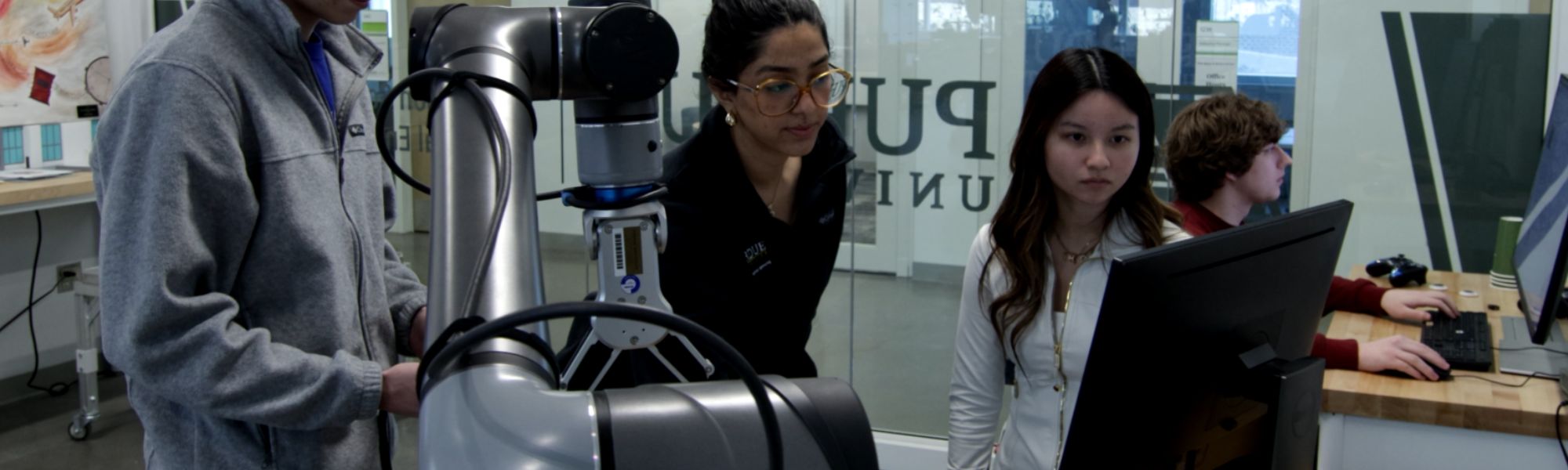 Purdue students working with robotics and artificial intelligence