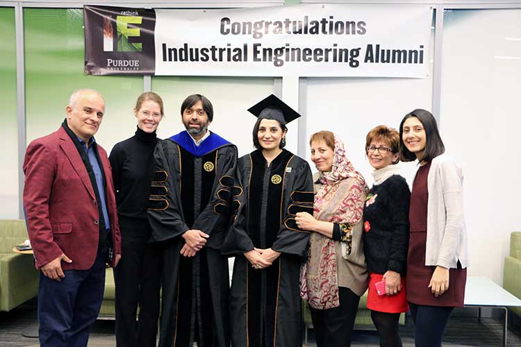 PhD grad Sara Shashaani, her family and advisors