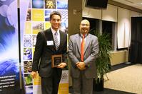Amrine receiving his award