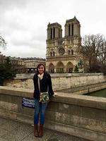 Lauren Reuland in front of Notre Dame Cathedral, Paris, France