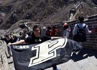 Rafael Salcedo hiking the Great Wall with Purdue spirit