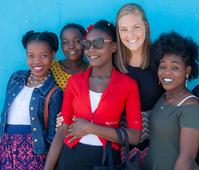 Photo of Lauren Neder with Haitian girls