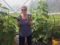 Photo of Joan Schwai with cukes