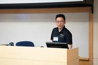 Photo of Nade Liang presenting at conference