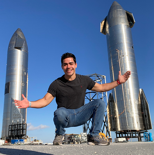 Michael Kadus in front of rockets.