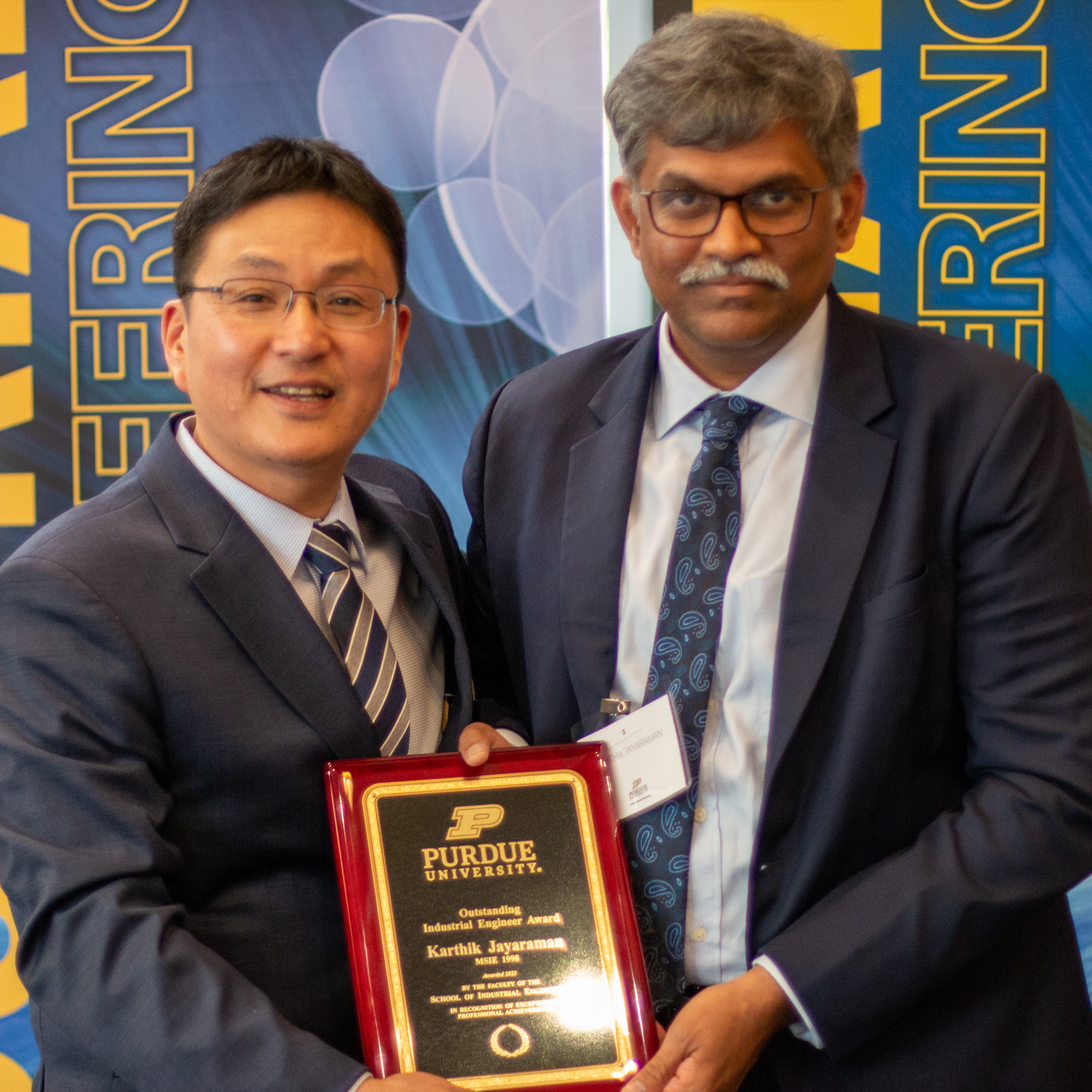 Posing with Dr. Son after accepting award.