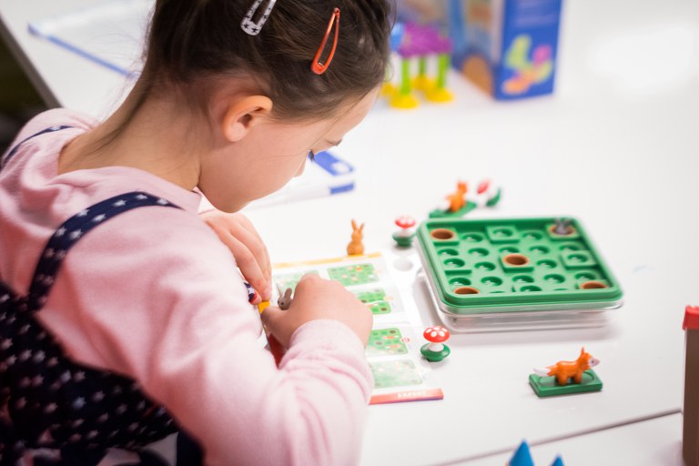 Child playing with toy from gift guide