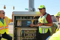 Demonstrations on traffic signal cabinet by INDOT's Jim Sturdevant