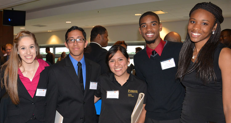 Group picture at a networking event of five people