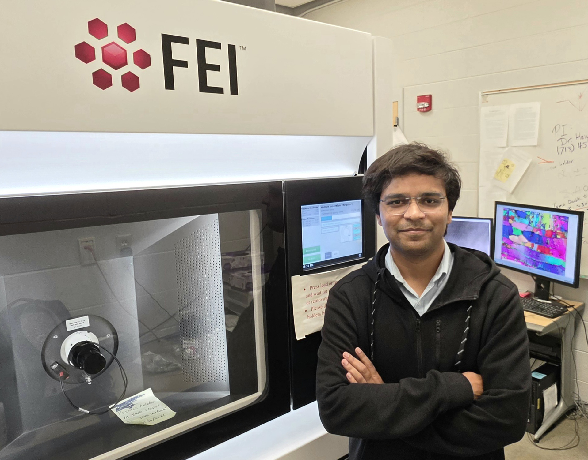 Purdue MSE PhD candidate Adil Wazeer from Prof. Xinghang Zhangs lab performs transmission electron microscopy experiments on a Talos 200X TEM at the Purdue Electron Microscopy Center.