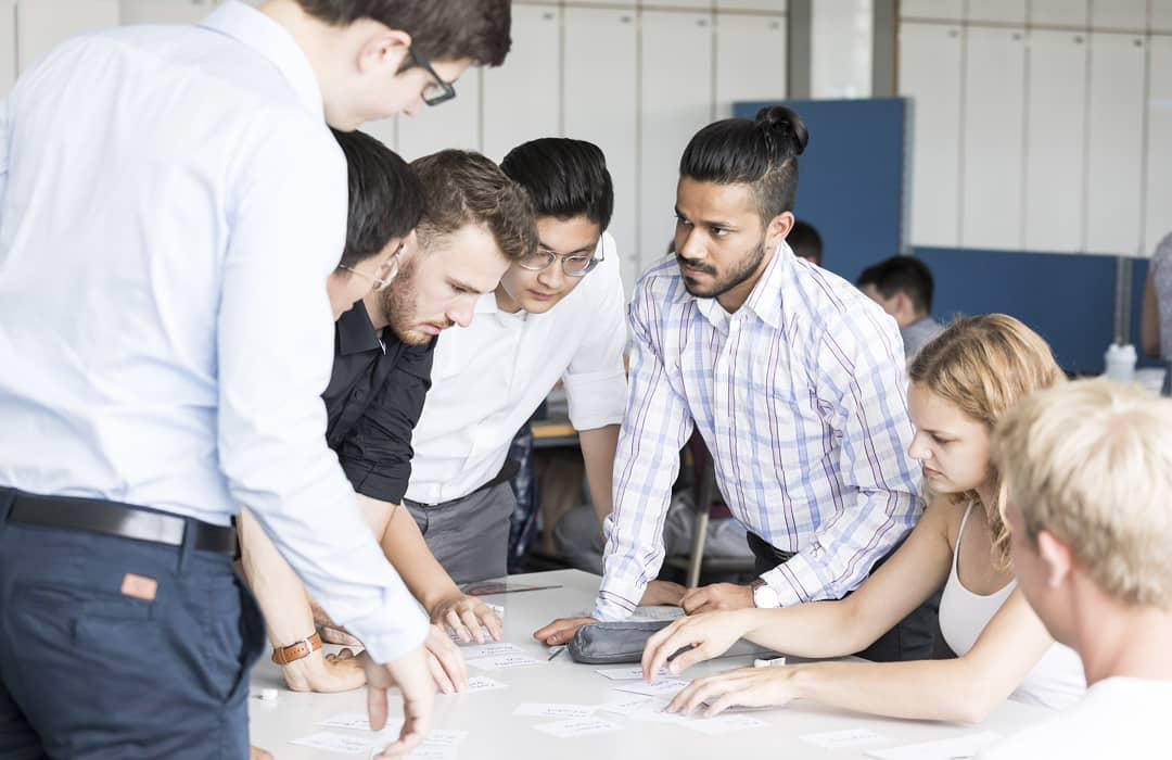 Group of students working together at a table.