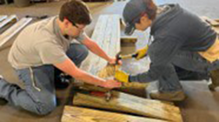 Lt Pessolano doing volunteer construction work