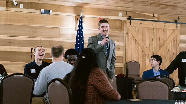 Student speaking at the December PMRI gathering