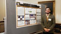 Santiago Guevara making poster presentation