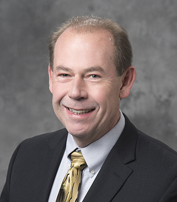 Headshot of John Sutherland