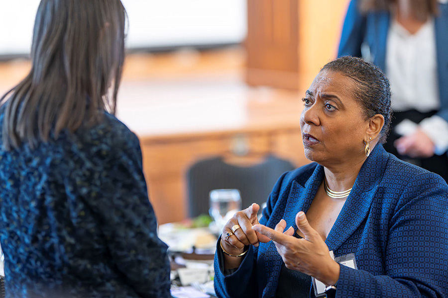 Angela Jenkins speaking to a student